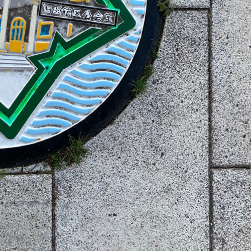 hakodate (manhole cover with a building)